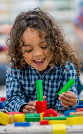 Girl playing with blocks