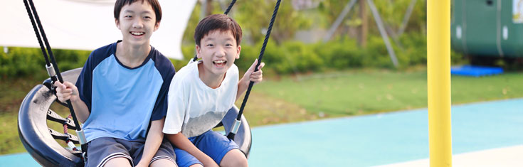 Boys on swing